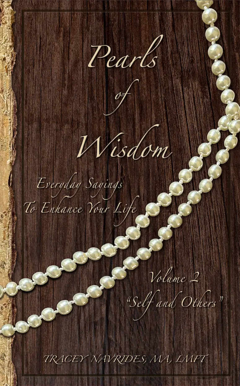 A book cover with pearls on it