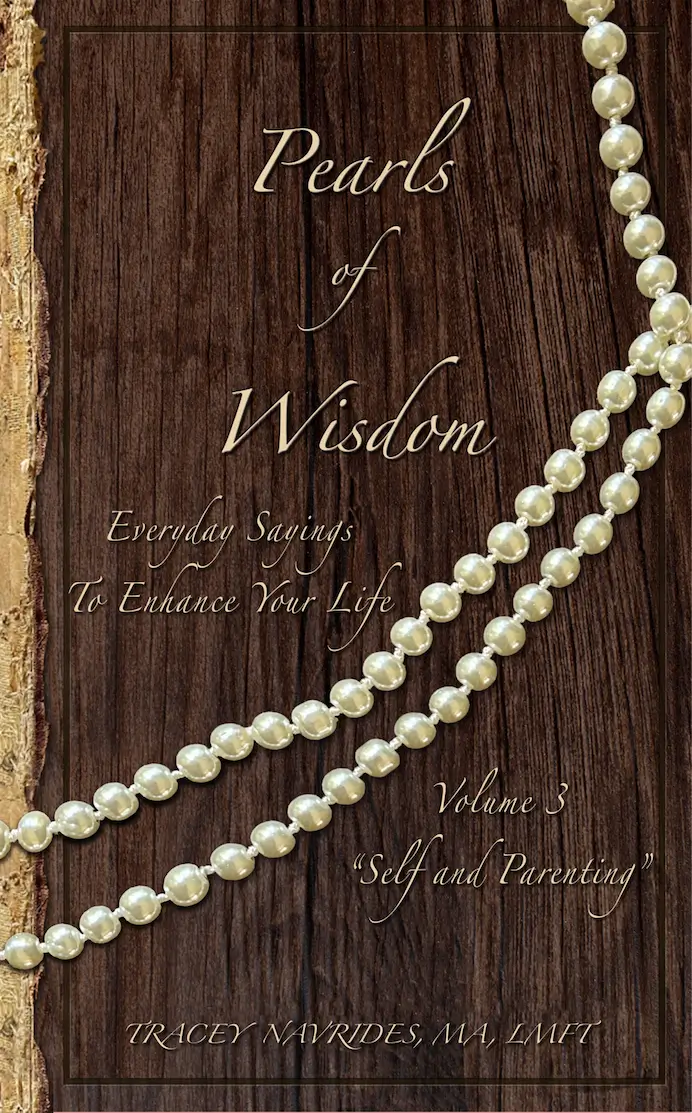 A book cover with pearls on it